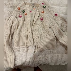 Cropped cream and flower sweater